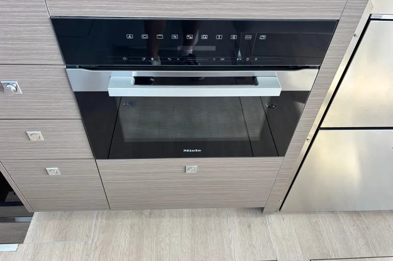 Faste Yacht Photos Pics Modern kitchen oven in a Leopard 52 yacht, 2025 model, with sleek design.