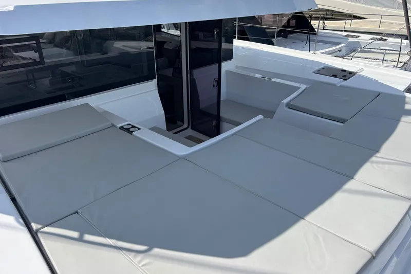 Faste Yacht Photos Pics Luxurious deck seating on 2025 Leopard 52 yacht, featuring sleek design and comfort.