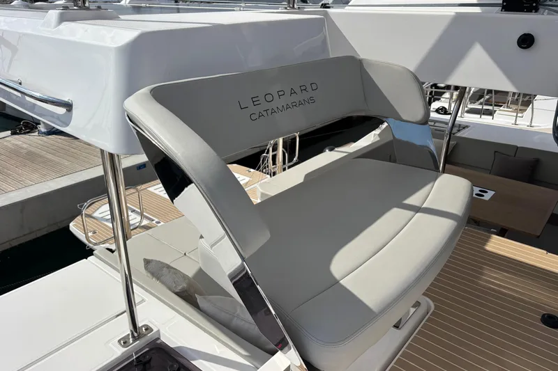 Faste Yacht Photos Pics Luxury seating on 2025 Leopard 52 catamaran, showcasing modern design and comfort.