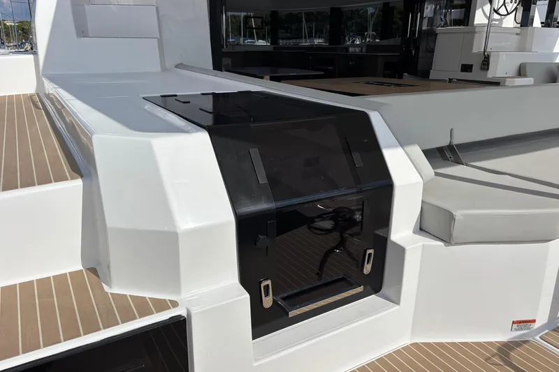 Faste Yacht Photos Pics 2025 Leopard 52 yacht deck with sleek design and modern seating area.