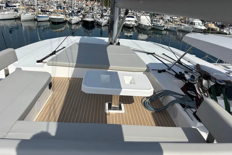 Faste Yacht Photos Pics Luxurious deck of 2025 Leopard 52 yacht with seating and marina view.