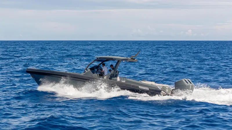 Skipper 38 Twin Mercury 400 Verado - Sunbed Ed. Yacht Photos Pics 2025 Skipper-BSK 38 boat cruising on open ocean waters.