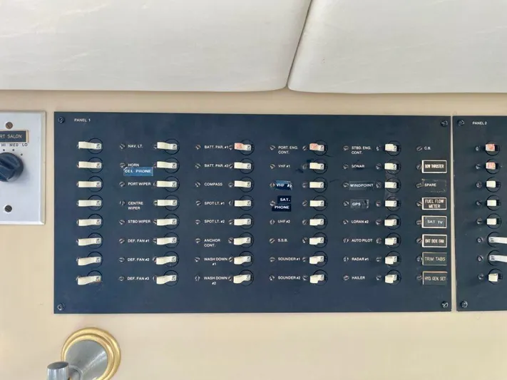  Yacht Photos Pics Control panel of a 1989 Pilothouse West Bay boat with labeled switches and knobs.