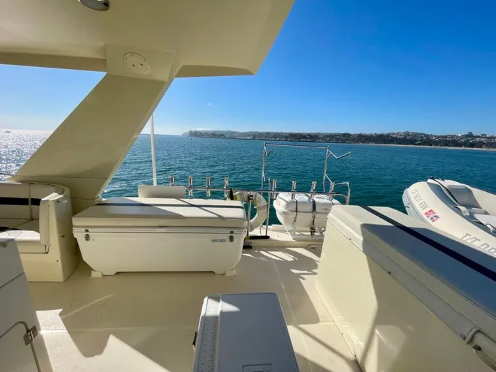  Yacht Photos Pics 1989 Pilothouse West Bay yacht deck with ocean view and clear blue sky.