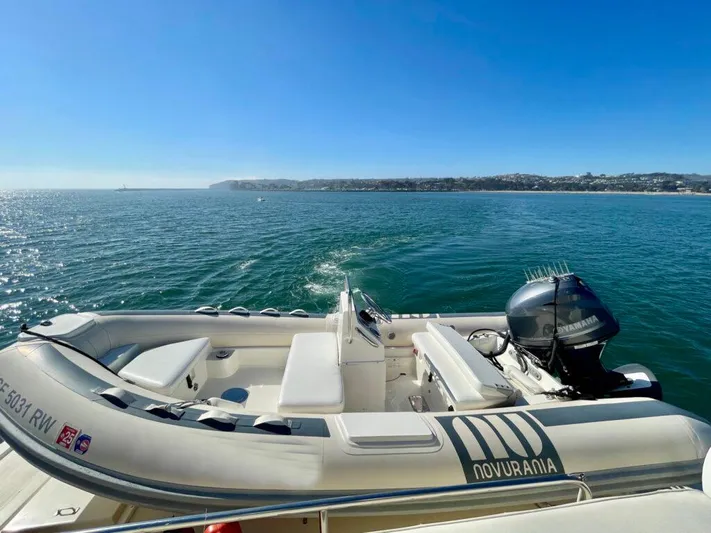  Yacht Photos Pics 1989 Pilothouse West Bay boat on open water with clear blue sky.