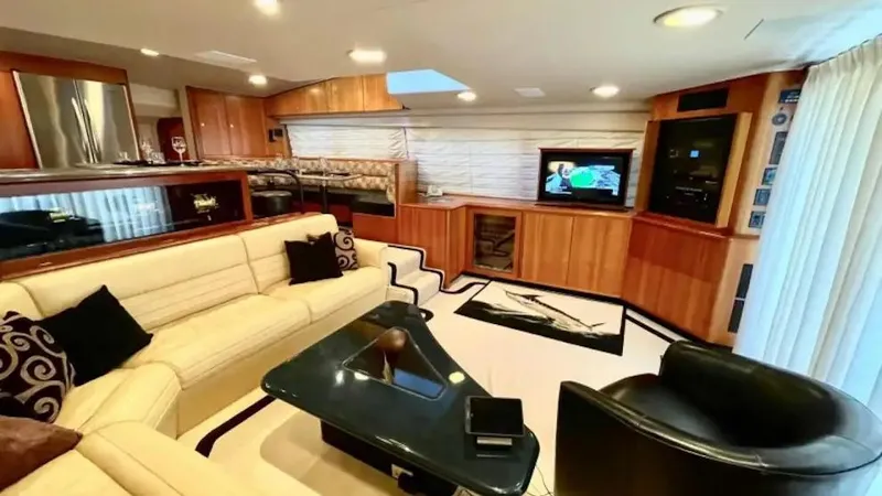 After Midnight Yacht Photos Pics Luxurious 1994 Knight & Carver Lux SF yacht interior with elegant seating and modern amenities.