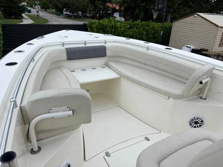  Yacht Photos Pics 2021 Cobia 301 Center Console boat with spacious seating and sleek design.