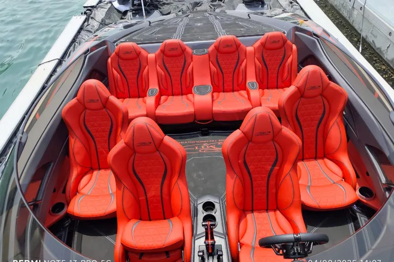  Yacht Photos Pics Luxury MTI 440X boat interior with vibrant red seating, 2025 model.
