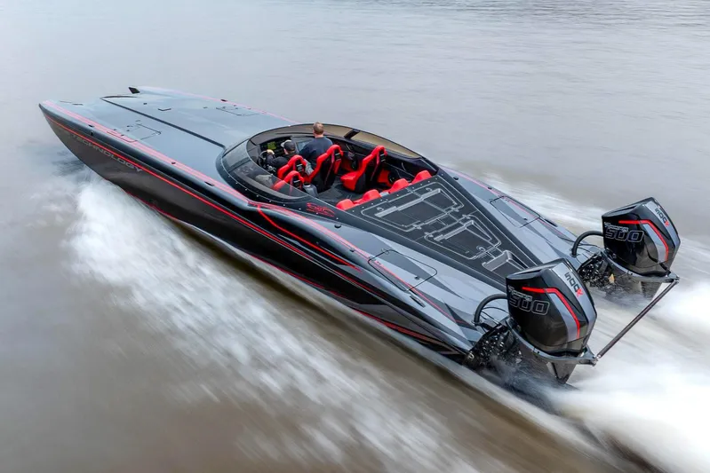  Yacht Photos Pics 2025 MTI 440X speedboat with dual engines cruising on water.