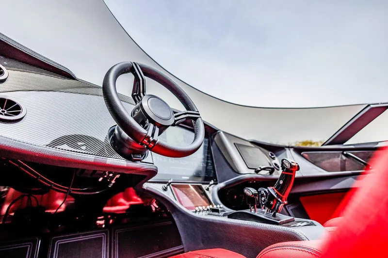  Yacht Photos Pics Interior of 2025 MTI 440X with sleek steering and advanced controls.