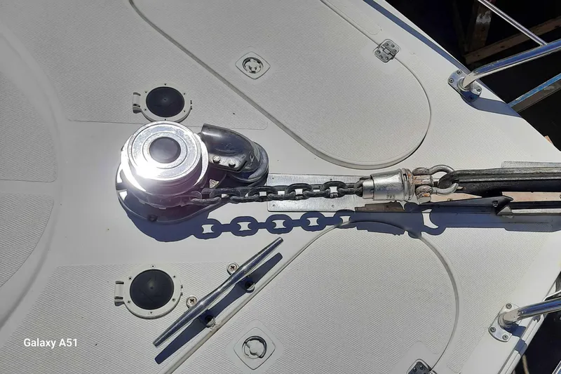  Yacht Photos Pics Deck of 2000 Carver 530 Voyager Pilothouse with anchor chain and winch.