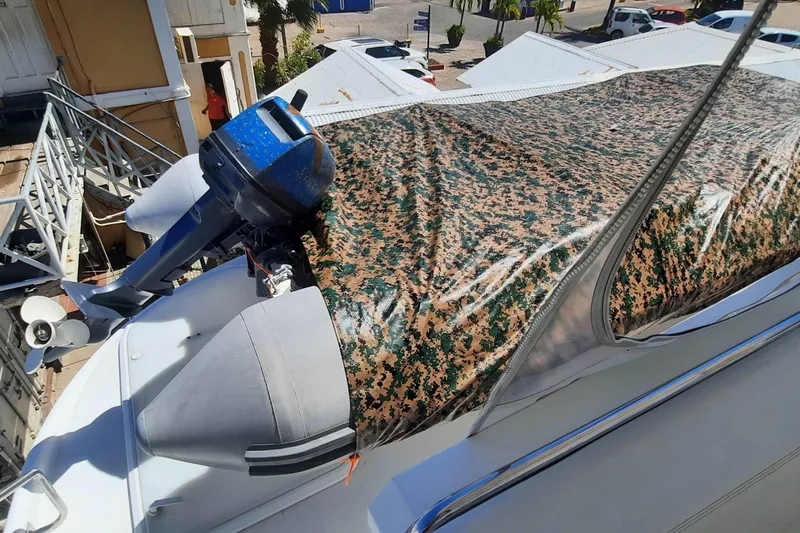  Yacht Photos Pics Inflatable boat with camouflage cover on Carver 530 Voyager Pilothouse, 2000 model.