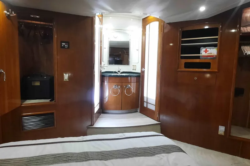  Yacht Photos Pics Luxurious interior of 2000 Carver 530 Voyager Pilothouse with wood finishes and modern amenities.