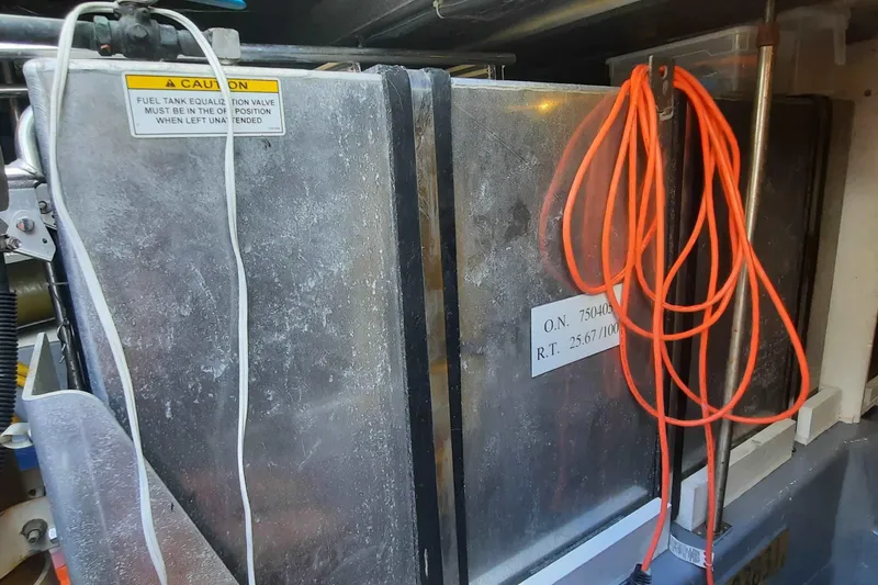  Yacht Photos Pics Engine room of 2000 Carver 530 Voyager Pilothouse with fuel tank and cables.