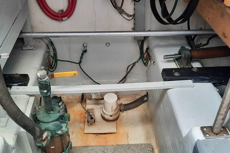  Yacht Photos Pics Engine compartment of 2000 Carver 530 Voyager Pilothouse with visible mechanical components.