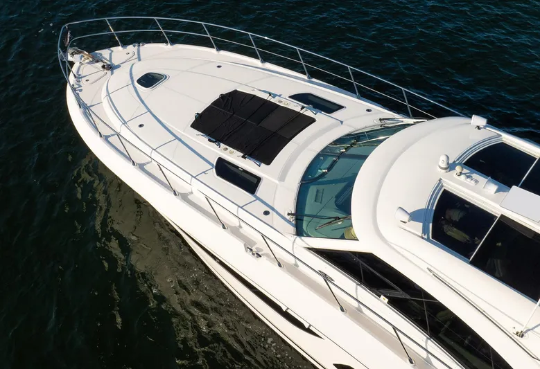 No Shoes Yacht Photos Pics 2013 Sea Ray 580 Sundancer yacht on water, aerial view.