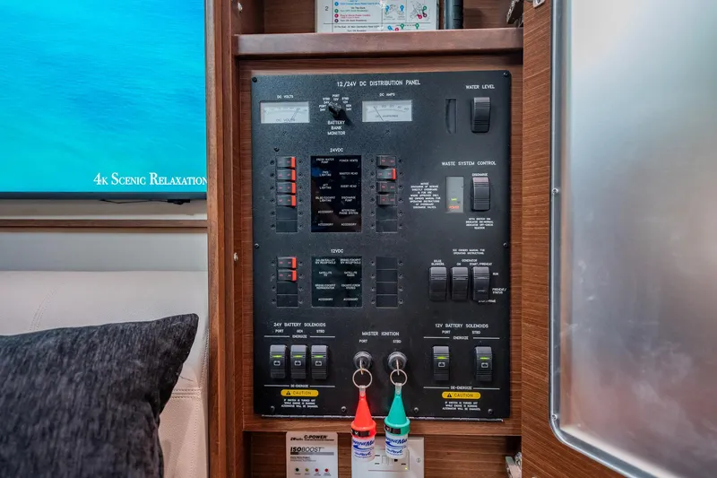 No Shoes Yacht Photos Pics Electrical control panel inside 2013 Sea Ray 580 Sundancer yacht cabin.