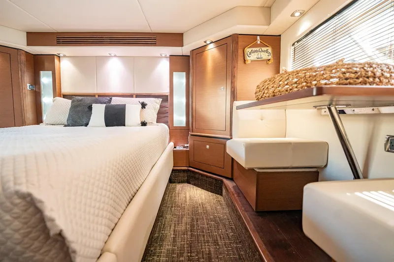 No Shoes Yacht Photos Pics Luxurious interior of 2013 Sea Ray 580 Sundancer yacht with elegant bedroom design.