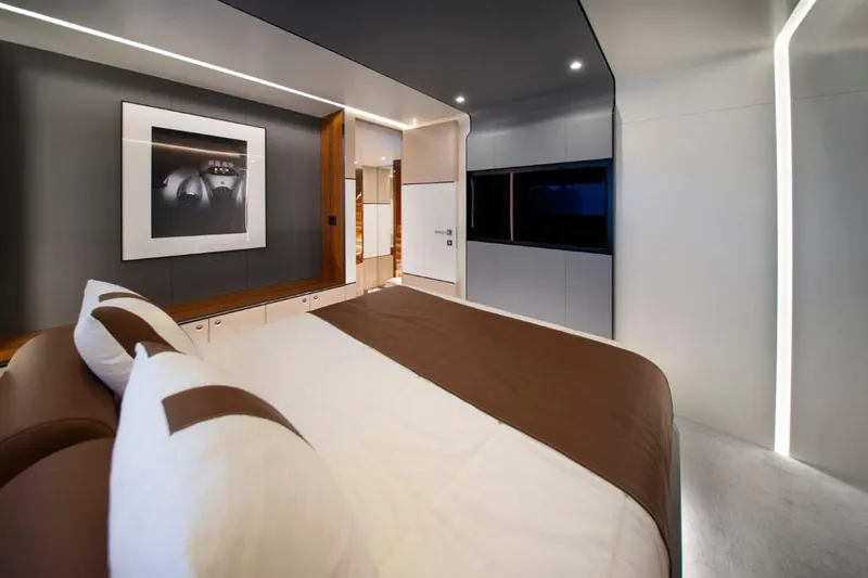 Yachting Conseil Yacht Photos Pics Luxurious interior of 2025 Astondoa AX8 yacht bedroom with modern design and elegant decor.