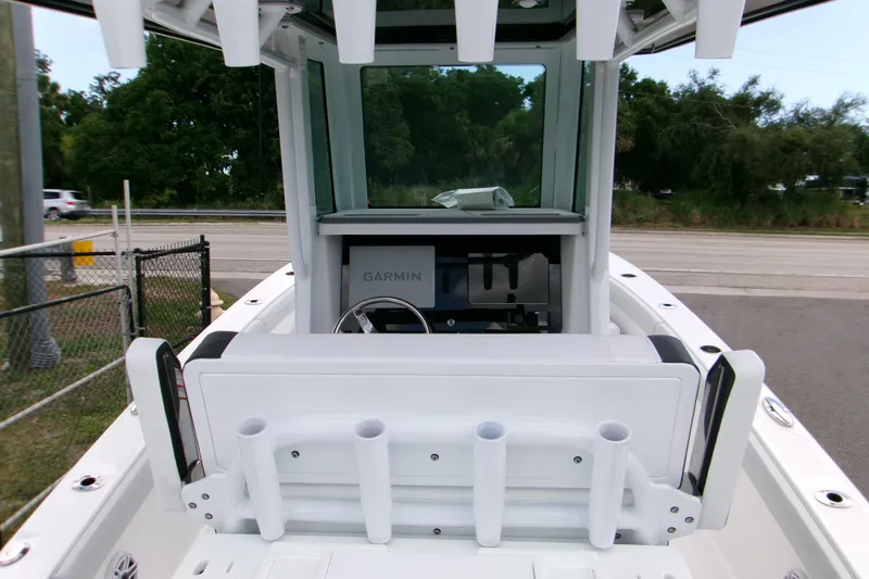  Yacht Photos Pics 2026 Blackfin 262 HB boat helm with Garmin navigation system and rod holders.
