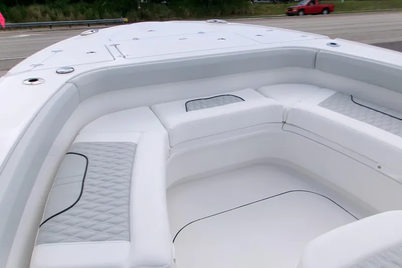  Yacht Photos Pics 2026 Blackfin 262 HB boat with luxurious white seating and quilted accents.