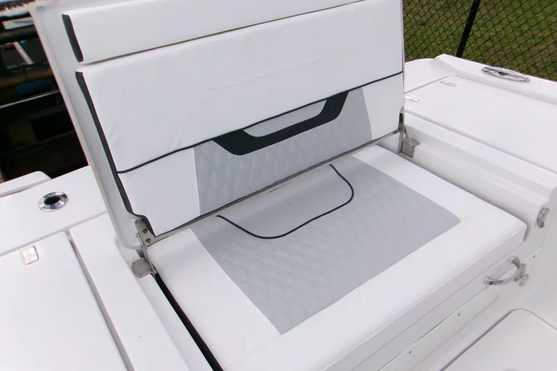 Yacht Photos Pics 2026 Blackfin 262 HB boat seat with white and gray cushioned design.