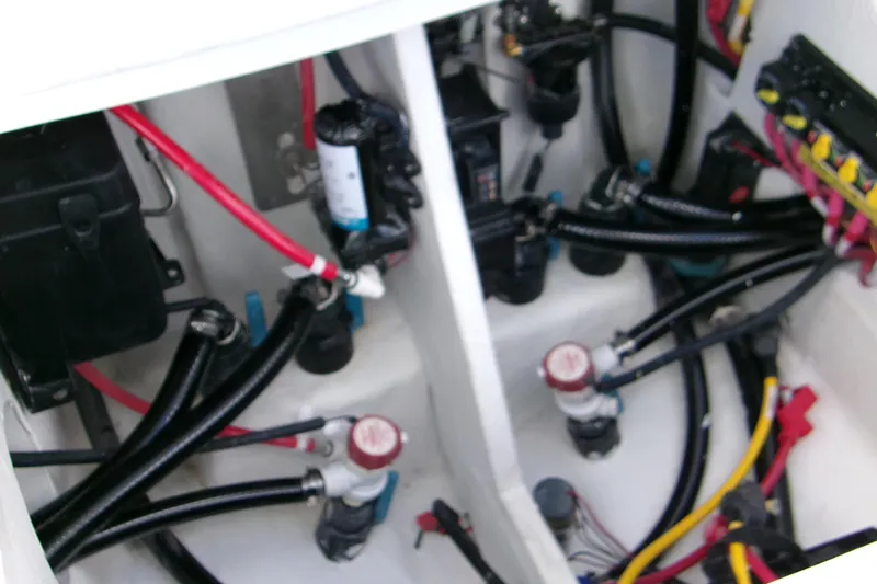 Yacht Photos Pics Engine compartment of 2026 Blackfin 262 HB boat with wiring and components.