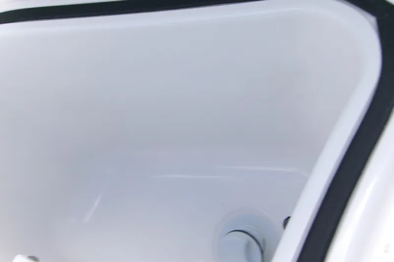  Yacht Photos Pics Interior view of 2026 Blackfin 262 HB boat compartment, featuring sleek white finish.