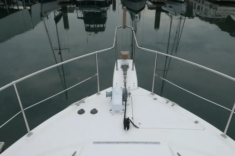  Yacht Photos Pics Bow view of 1994 Bayliner 4388 Motor Yacht docked in marina.