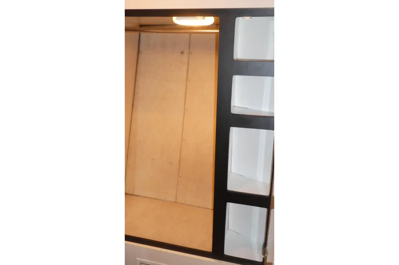  Yacht Photos Pics Interior shelving of 1994 Bayliner 4388 Motor Yacht with built-in lighting.