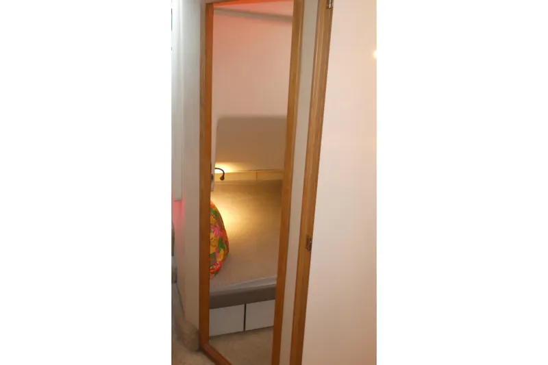  Yacht Photos Pics Cozy cabin interior of 1994 Bayliner 4388 Motor Yacht with warm lighting.