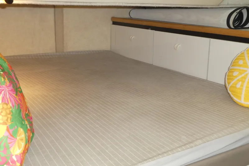  Yacht Photos Pics Cozy cabin interior of 1994 Bayliner 4388 Motor Yacht with colorful pillows.