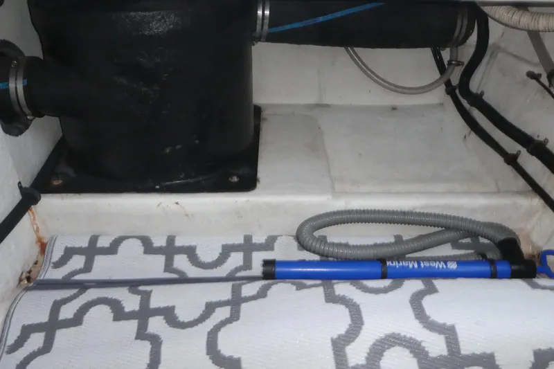  Yacht Photos Pics Engine compartment of 1994 Bayliner 4388 Motor Yacht with hoses and equipment.