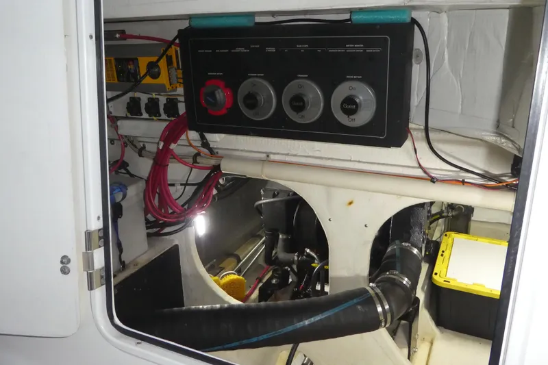  Yacht Photos Pics Engine room of 1994 Bayliner 4388 Motor Yacht with control panel and wiring.