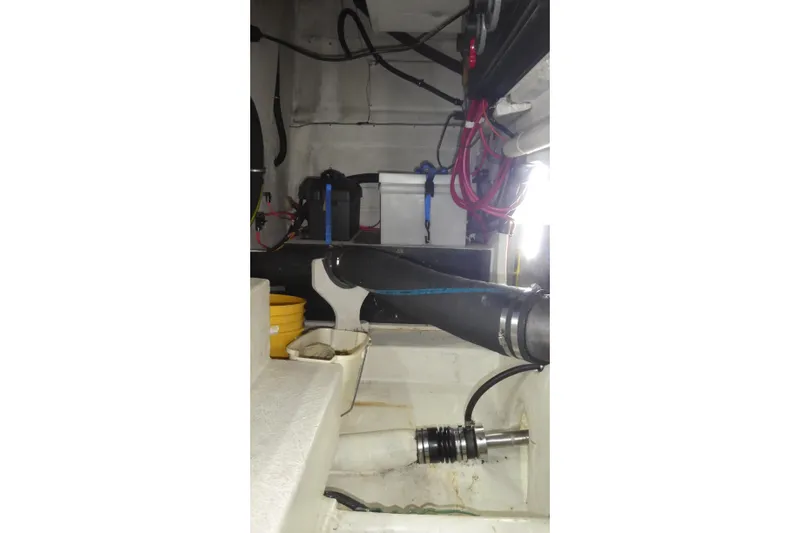  Yacht Photos Pics Engine room of 1994 Bayliner 4388 Motor Yacht with visible hoses and wiring.