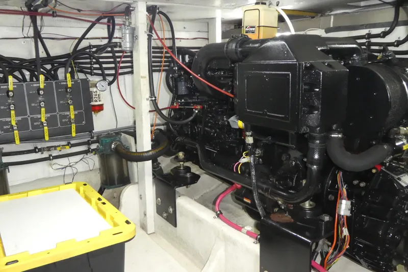  Yacht Photos Pics Engine room of 1994 Bayliner 4388 Motor Yacht with visible wiring and machinery.