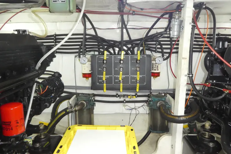  Yacht Photos Pics Engine room of 1994 Bayliner 4388 Motor Yacht with mechanical components and wiring.