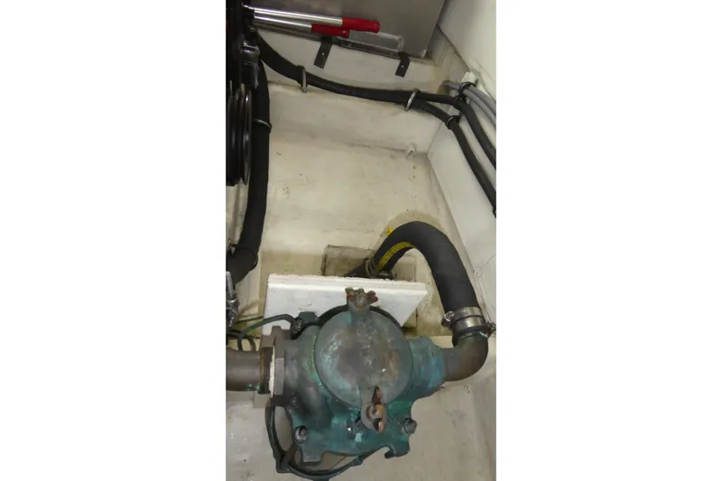  Yacht Photos Pics Engine room of 1994 Bayliner 4388 Motor Yacht showing mechanical components and hoses.