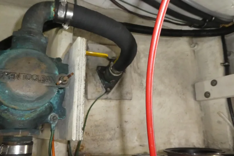  Yacht Photos Pics Engine compartment of 1994 Bayliner 4388 Motor Yacht with visible hoses and components.