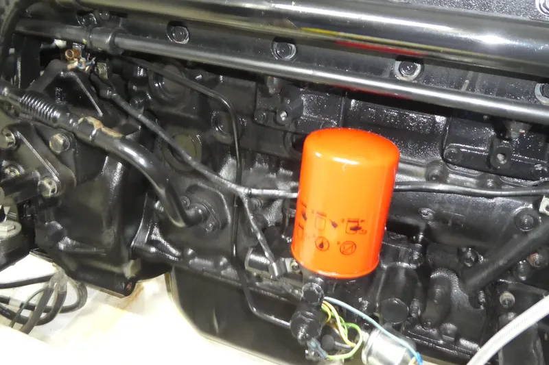  Yacht Photos Pics Engine of 1994 Bayliner 4388 Motor Yacht with visible orange oil filter.