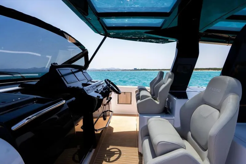 Pardo 50 Yacht Photos Pics Interior view of 2023 Pardo Yachts Pardo 50 with luxurious seating and ocean backdrop.