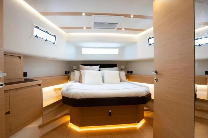 Pardo 50 Yacht Photos Pics Luxurious cabin interior of 2023 Pardo Yachts Pardo 50 with modern design and ambient lighting.