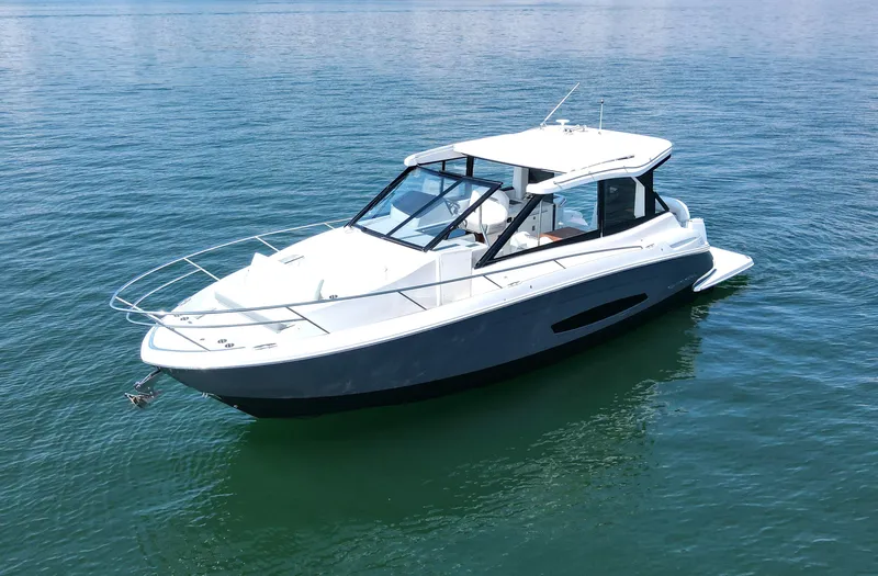 Princess Maya Yacht Photos Pics 2024 Regal 36 Grande Coupe luxury yacht on calm blue water.