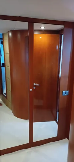  Yacht Photos Pics Interior of 2006 Sunseeker Manhattan 60 yacht with wooden door and modern design.