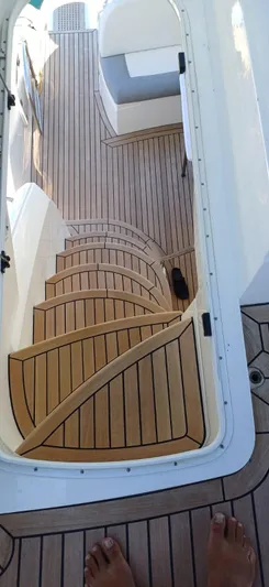  Yacht Photos Pics Staircase on 2006 Sunseeker Manhattan 60 yacht with teak decking.