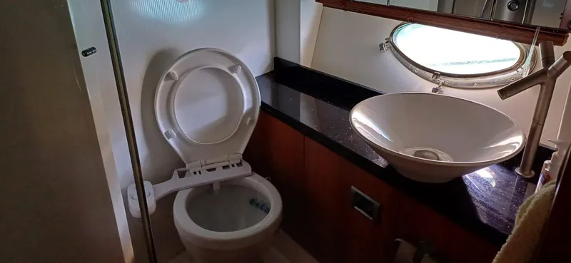  Yacht Photos Pics Luxury bathroom in 2006 Sunseeker Manhattan 60 yacht with modern sink and toilet.