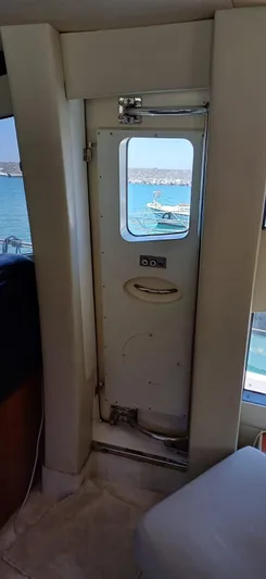  Yacht Photos Pics Interior view of 2006 Sunseeker Manhattan 60 yacht door with ocean backdrop.