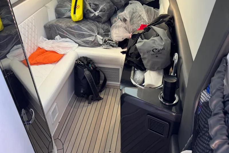  Yacht Photos Pics Interior of 2022 Nor-Tech 450 Sport Center Console with seating and storage bags.