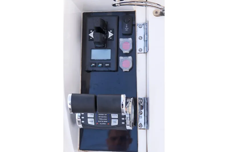  Yacht Photos Pics Control panel of 2022 Princess S66 yacht with throttle and switches.