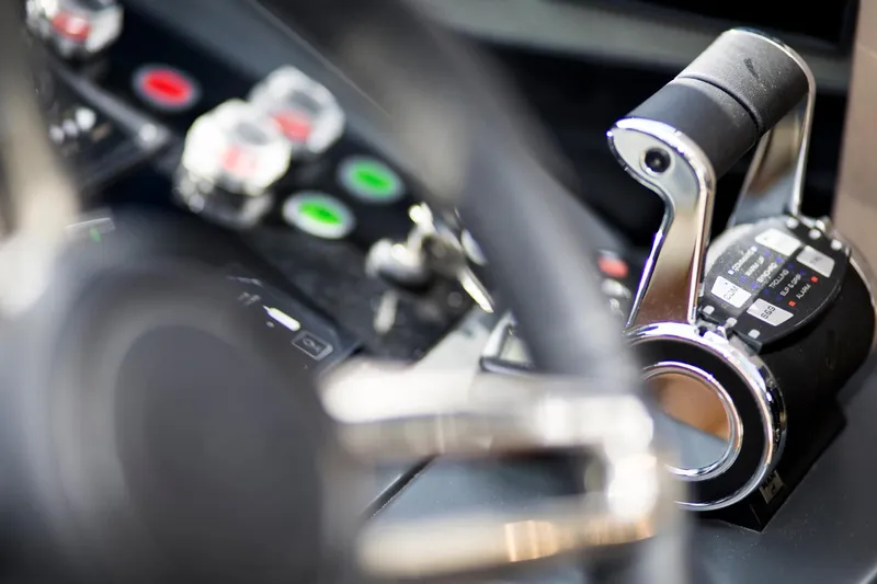  Yacht Photos Pics Control panel of 2022 Princess S66 yacht with throttle and buttons.